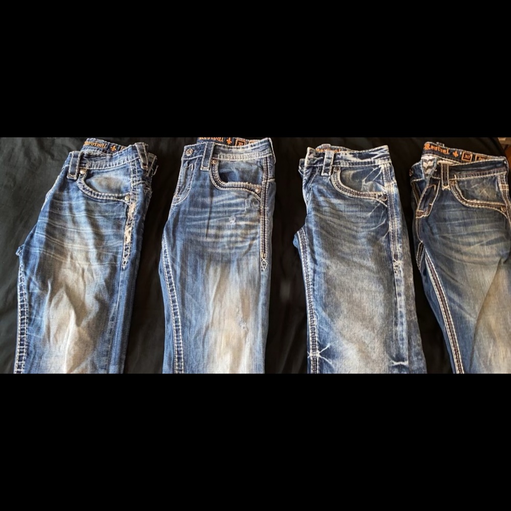 4 pairs of rock revival jeans.